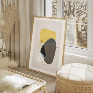 affiche avec formes abstraites jaunes et grises tourbillon noir et lignes fines salon beige.webp