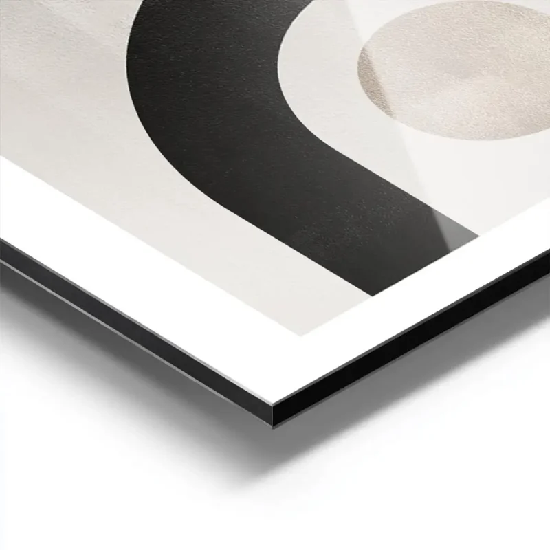 affiche avec formes abstraites noires et beiges sur fond gris beige typographie aluminium.webp