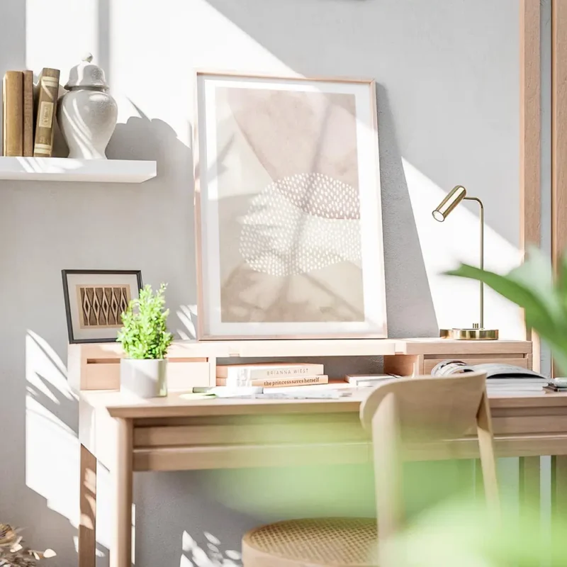 affiche avec formes abstraites roses et beiges une forme ovale texturee de point bureau.webp