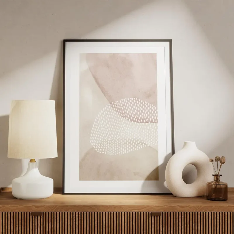 affiche avec formes abstraites roses et beiges une forme ovale texturee de point meuble.webp