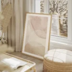 affiche avec formes abstraites roses et beiges une forme ovale texturee de point salon beige.webp