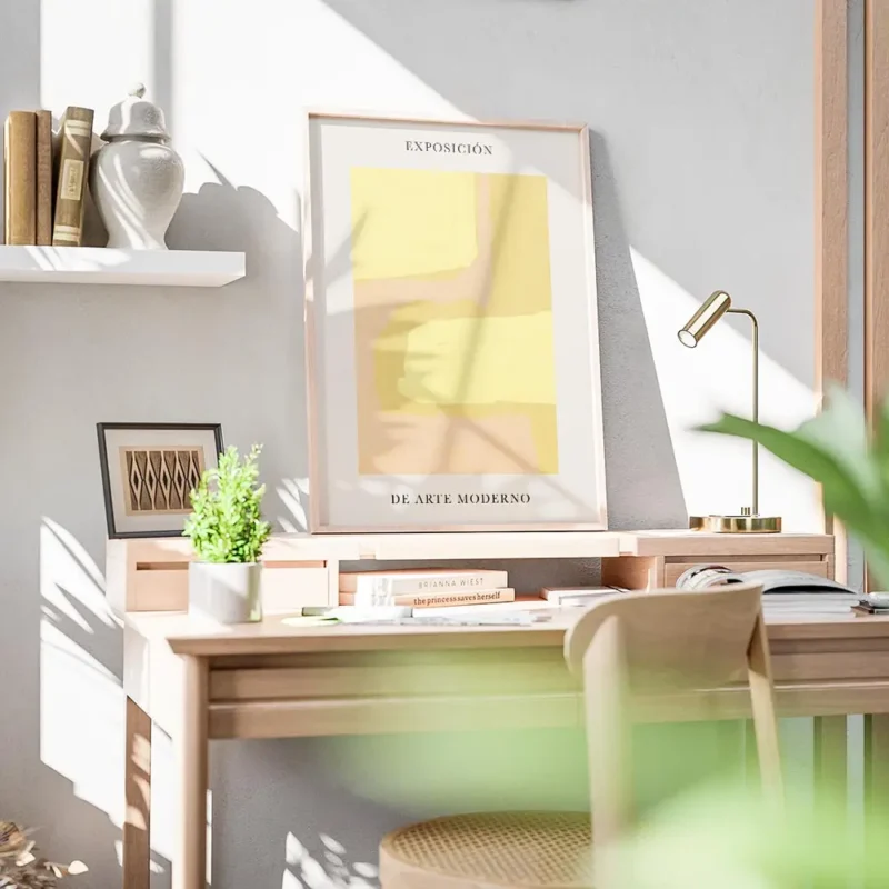 affiche avec formes abstraites roses et jaunes sur fond clair avec du texte en t bureau.webp