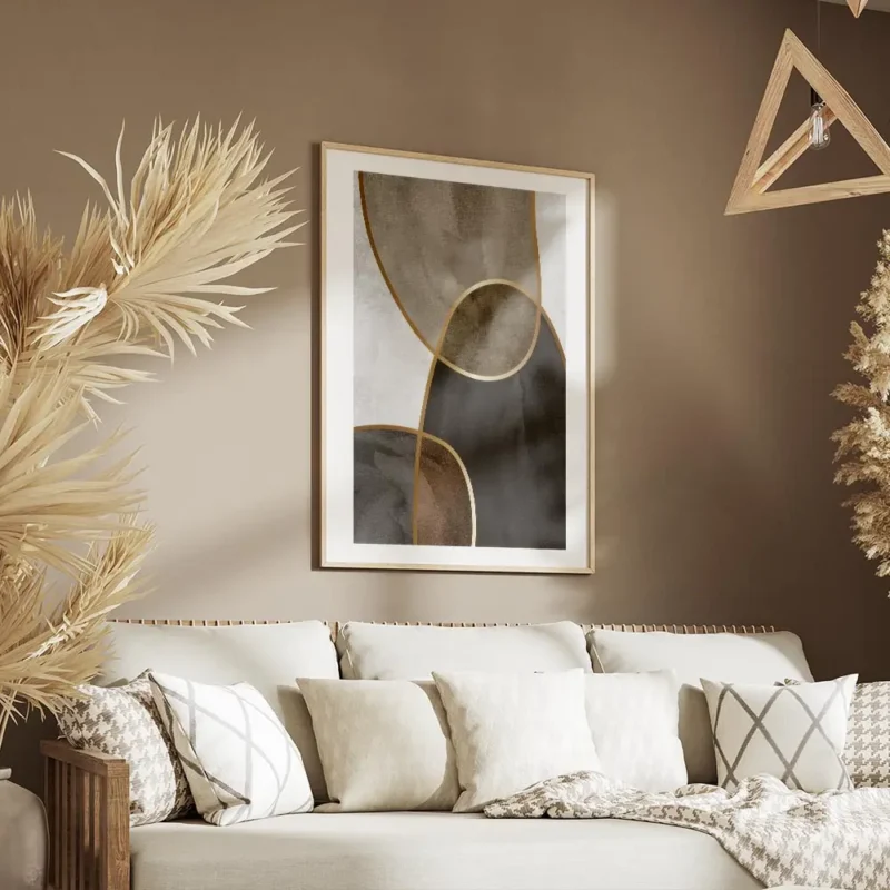 affiche avec formes aquarelles beiges marron et noires separees par des lignes d salon.webp