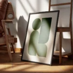 affiche avec formes geometriques vertes et rectangles sur fond beige clair encadre.webp