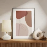 affiche avec formes graphiques abstraites et lignes courbes en tons de rose et r meuble.webp