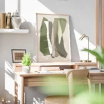 affiche avec formes graphiques vertes blanches grises et marron sur fond beige s bureau.webp