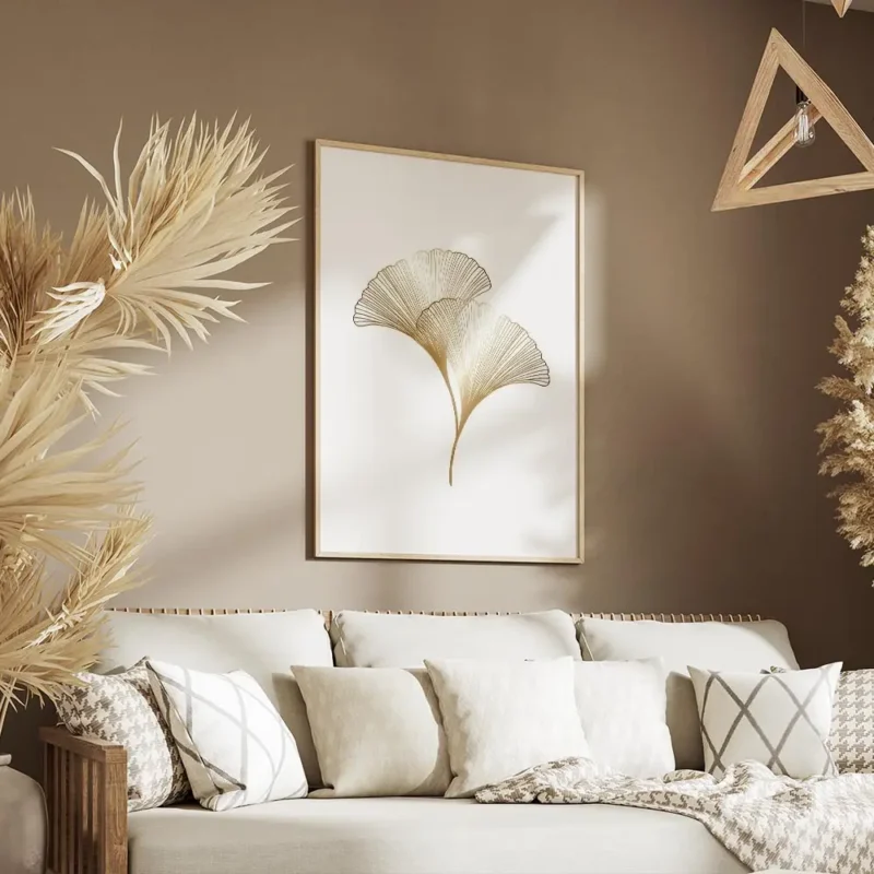 affiche avec illustration de deux feuilles de ginkgo dorees avec un design graph salon.webp