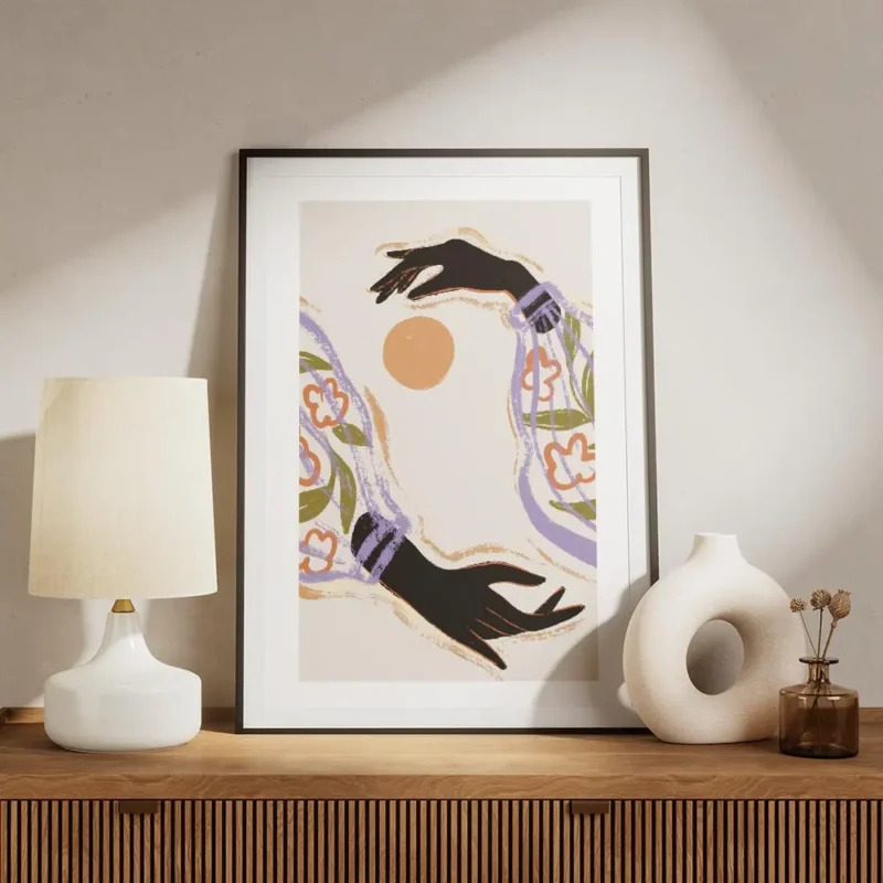 affiche avec illustration de deux mains noires aux manches fleuries et violettes meuble.webp