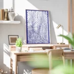 affiche avec illustration de feuilles de palmier blanches aux lignes fluides sur bureau.webp