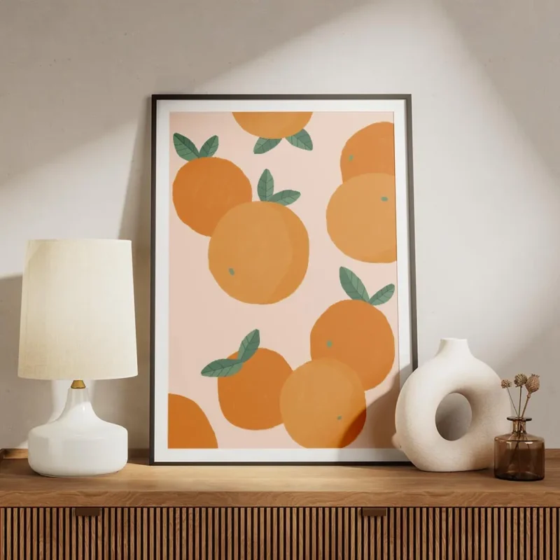 affiche avec illustration de plusieurs oranges et feuilles vertes sur fond clair meuble.webp
