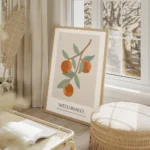 affiche avec illustration dune branche doranger portant des oranges et des feuil salon beige.webp