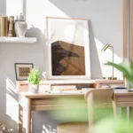 affiche avec illustration graphique de dunes de sable marron une ombre foncee et bureau.webp