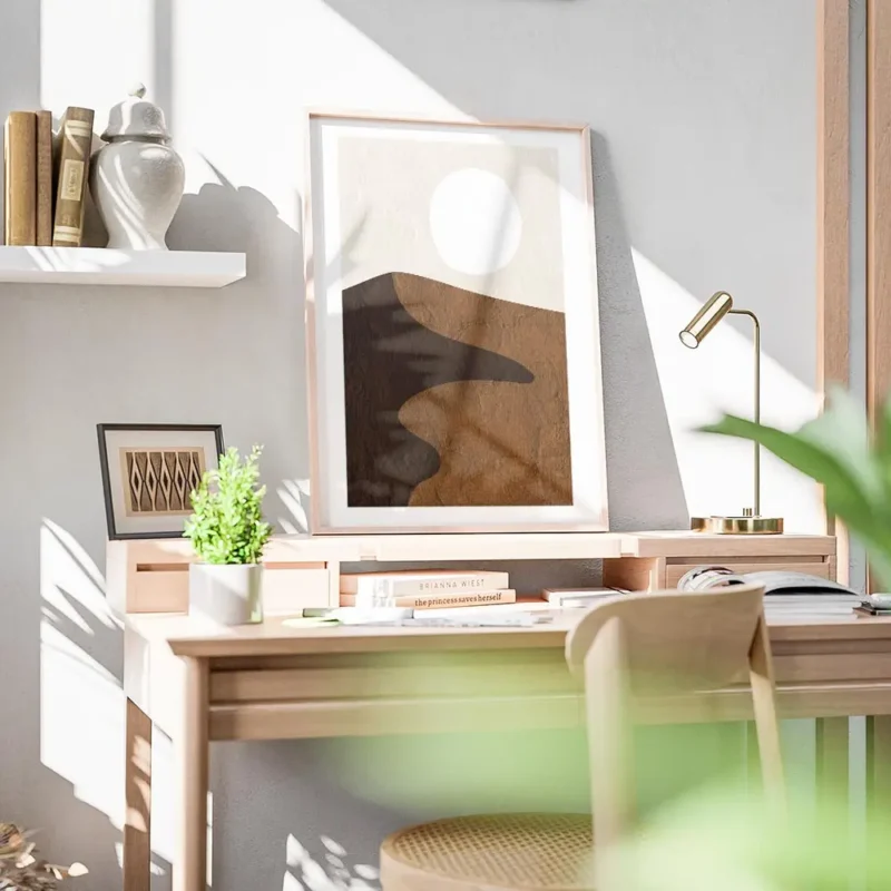 affiche avec illustration graphique de dunes de sable marron une ombre foncee et bureau.webp