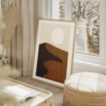 affiche avec illustration graphique de dunes de sable marron une ombre foncee et salon beige.webp