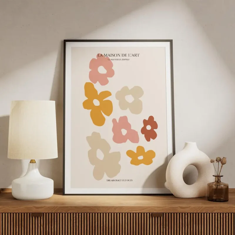 affiche avec illustration graphique de fleurs decoupees roses orange et beiges s meuble.webp