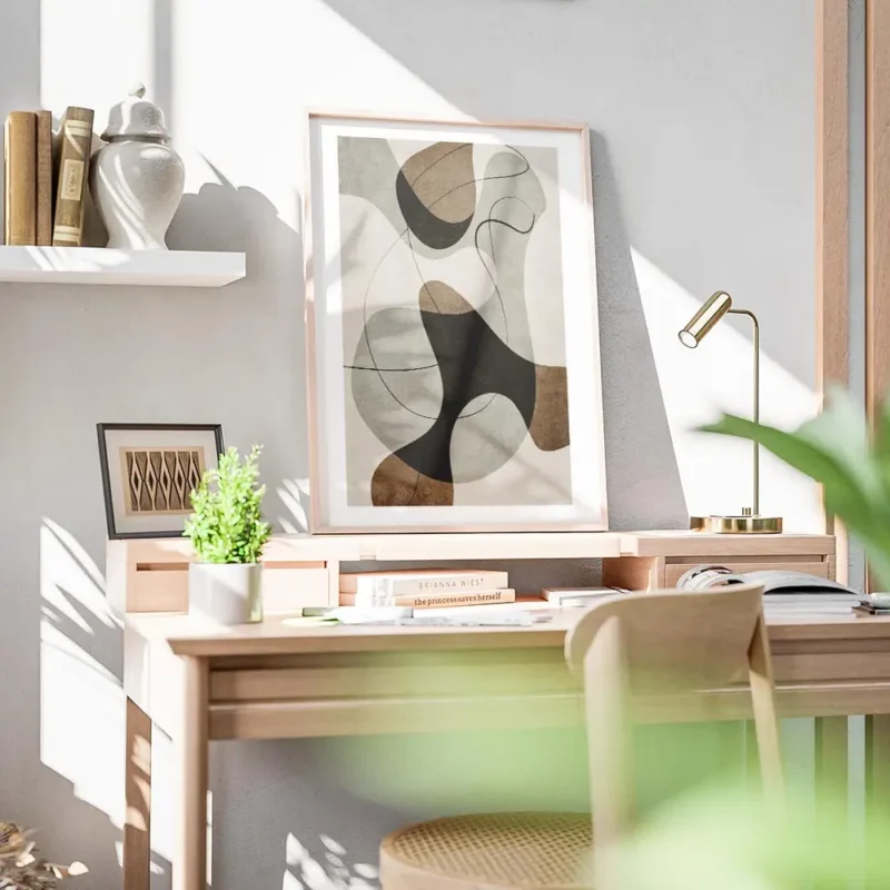 affiche avec illustration graphique de formes abstraites marron grises et noires bureau.webp