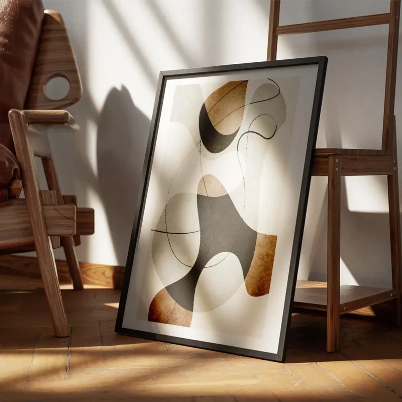 affiche avec illustration graphique de formes abstraites marron grises et noires encadre.webp