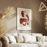 affiche avec illustration graphique rouge et beige dun visage abstrait et dune m salon.webp