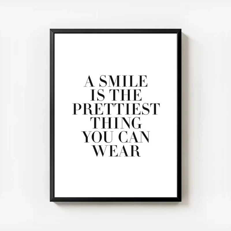 affiche avec la citation a smile is the prettiest thing you can wear en typograp avec cadre.webp