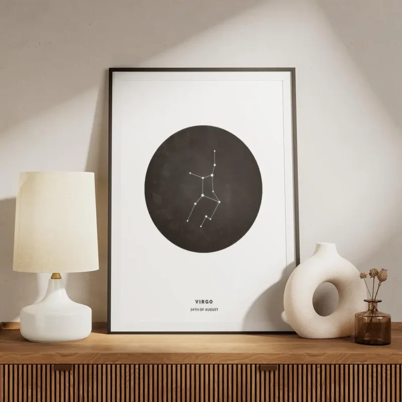 affiche avec la constellation de la vierge en blanc dans un cercle noir sur un f meuble.webp