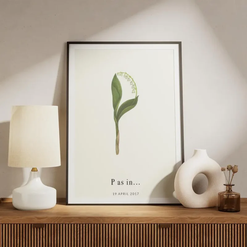 affiche avec la lettre p formee par du muguet et du texte typographie noir en ba meuble.webp