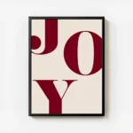 affiche avec le mot joy en grandes lettres rouges typographie serif sur un fond avec cadre.webp