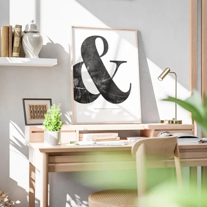 affiche avec le symbole esperluette en marbre noir sur fond blanc typographie el bureau.webp