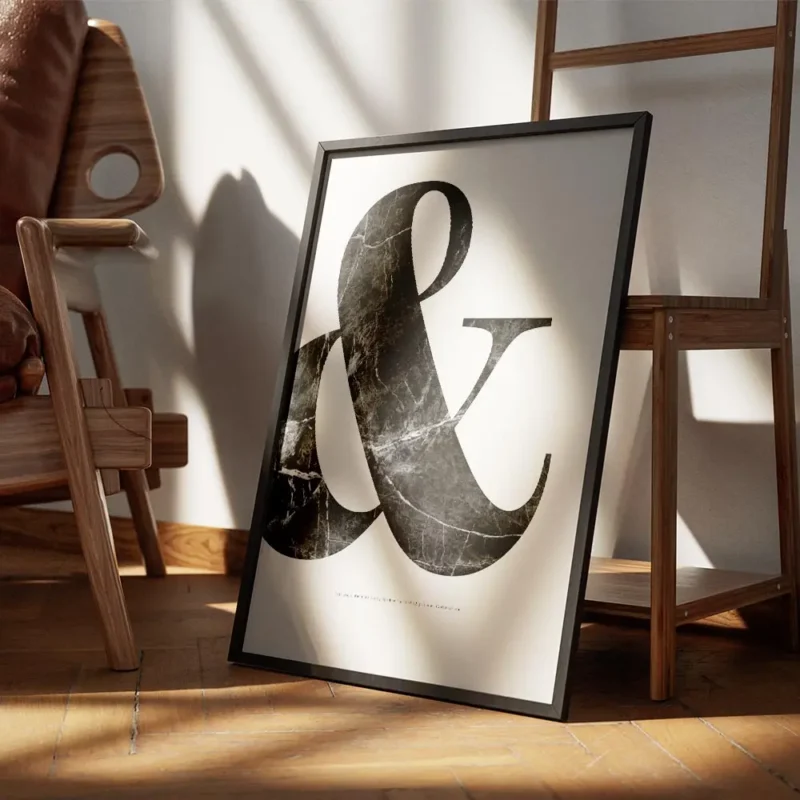 affiche avec le symbole esperluette en marbre noir sur fond blanc typographie el encadre.webp