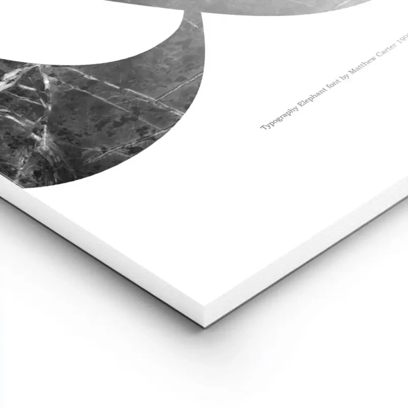 affiche avec le symbole esperluette en marbre noir sur fond blanc typographie el lightpanel.webp