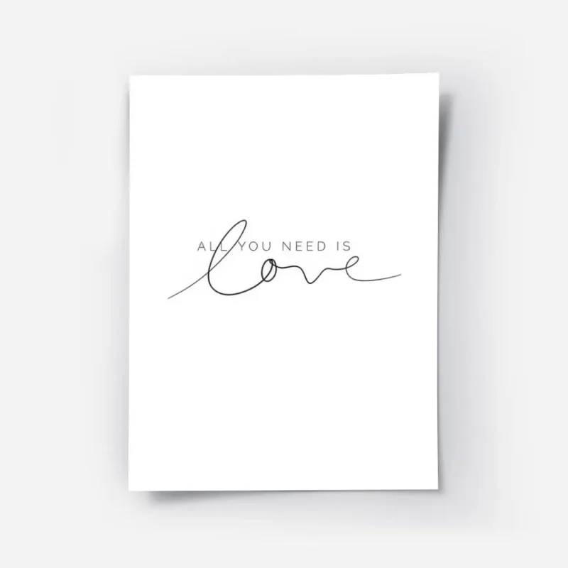 affiche avec le texte all you need is love en typographie noire sur fond blanc.webp