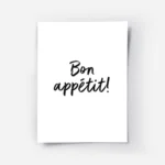 affiche avec le texte bon appetit en calligraphie noire sur fond blanc typograph.webp