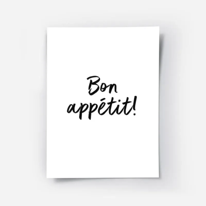 affiche avec le texte bon appetit en calligraphie noire sur fond blanc typograph.webp