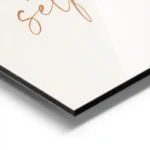 affiche avec le texte health begins with self care en orange sur fond beige clai aluminium.webp