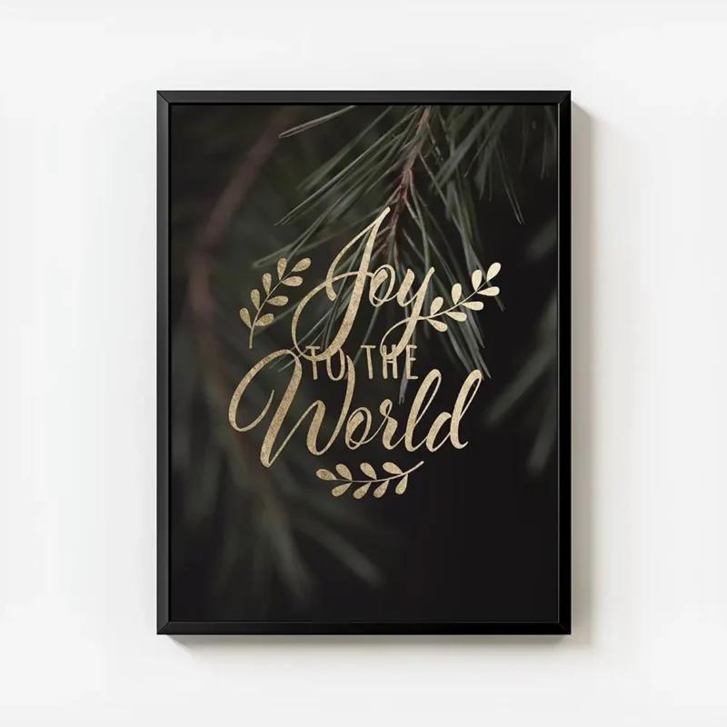 affiche avec le texte joy to the world en typographie doree sur un fond vert fon avec cadre.webp
