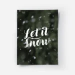 affiche avec le texte let it snow en typographie blanche manuscrite sur un fond .webp