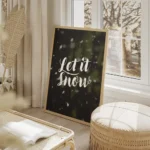affiche avec le texte let it snow en typographie blanche manuscrite sur un fond salon beige.webp