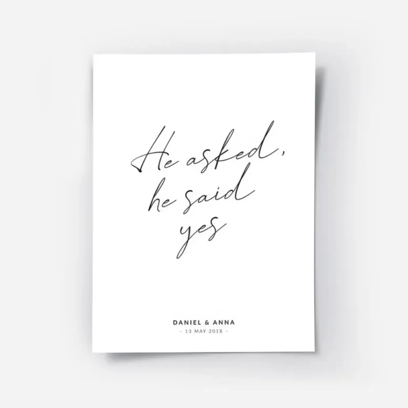 affiche avec le texte manuscrit he asked he said yes et la date sur fond blanc.webp