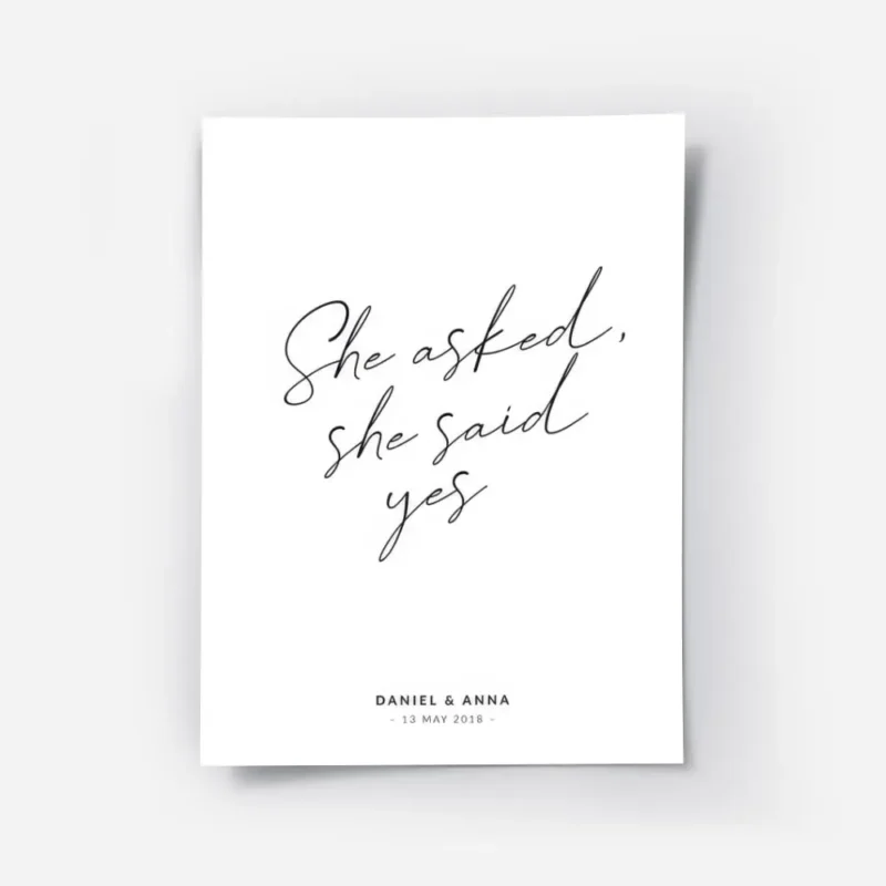 affiche avec le texte she asked she said yes en typographie manuscrite noire sur.webp