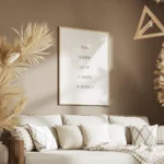 affiche avec le texte you look like i need a drink en typographie noire fine sur salon.webp