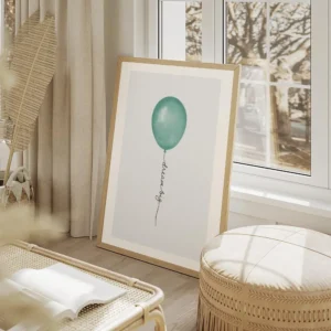 affiche avec lillustration graphique dun ballon vert sur fond gris le texte drea salon beige.webp