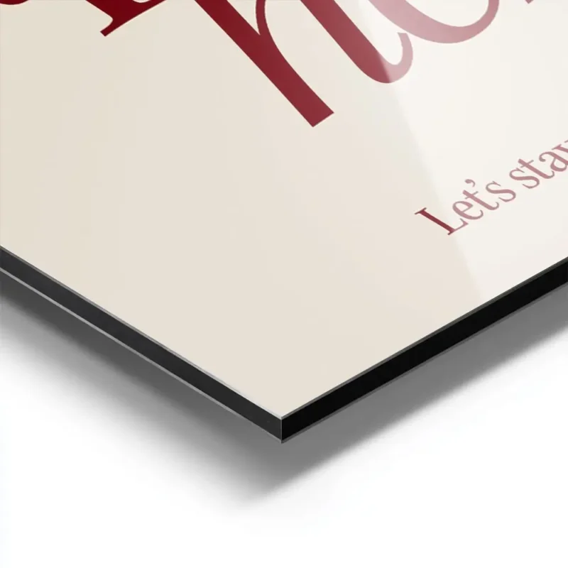 affiche avec linscription life happens here en rouge fonce et lets stay for a wh aluminium.webp