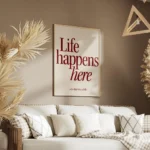 affiche avec linscription life happens here en rouge fonce et lets stay for a wh salon.webp
