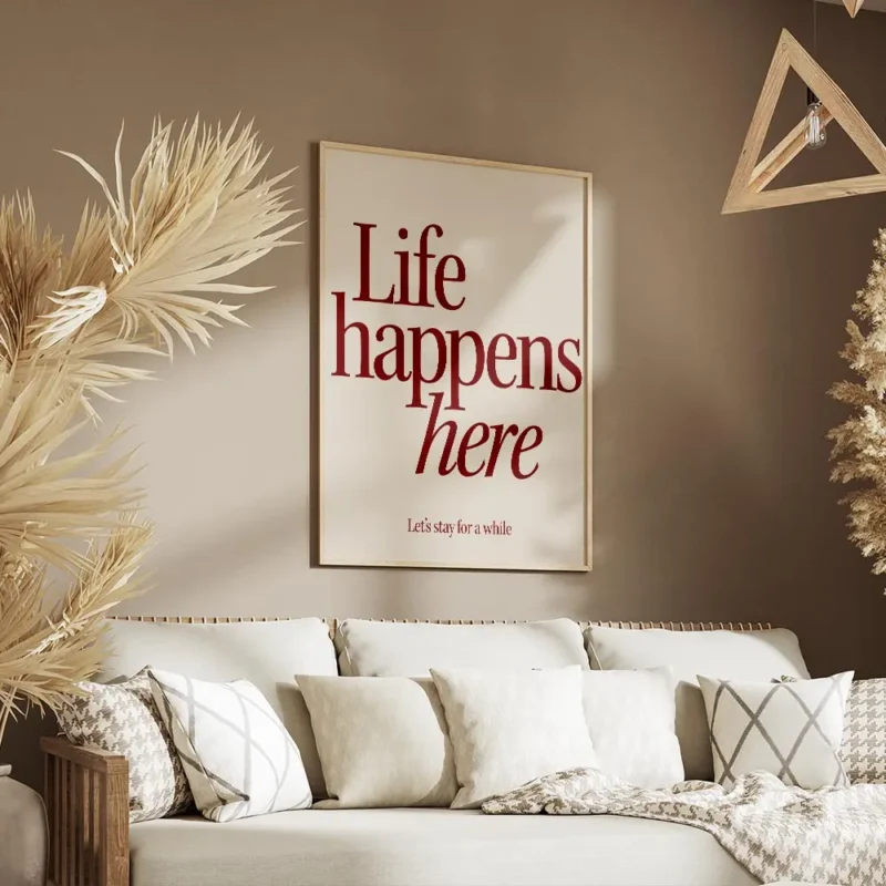affiche avec linscription life happens here en rouge fonce et lets stay for a wh salon.webp