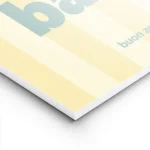 affiche avec linscription pasta la vista baby en bleu sur fond raye jaune clair lightpanel.webp