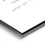 affiche avec typographie noire sur fond blanc citant sometimes the smallest step aluminium.webp