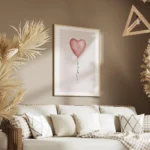 affiche avec un ballon rose en forme de c ur et le texte be kind en typographie salon.webp