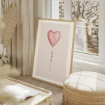 affiche avec un ballon rose en forme de c ur et le texte be kind en typographie salon beige.webp