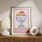 affiche avec un bol de glace bleu contenant trois boules colorees et le mot gela meuble.webp