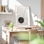 affiche avec un cercle noir et un carre trace sur un fond beige art graphique bureau.webp