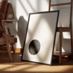 affiche avec un cercle noir et un carre trace sur un fond beige art graphique encadre.webp